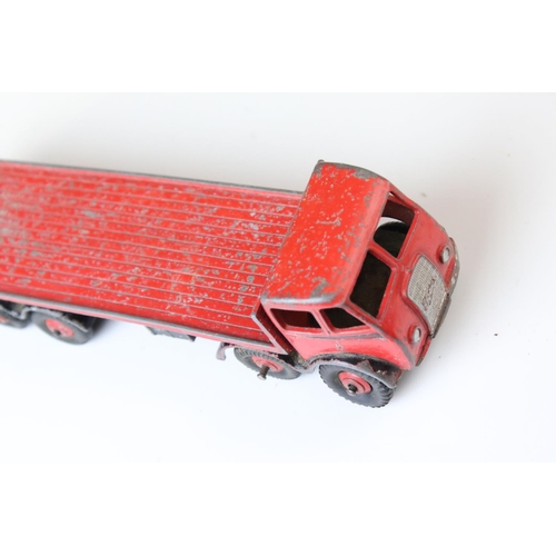 1052 - Two boxed Dinky Supertoys diecast models to include 502 Foden Flat Truck in red (heavy playwear) and... 