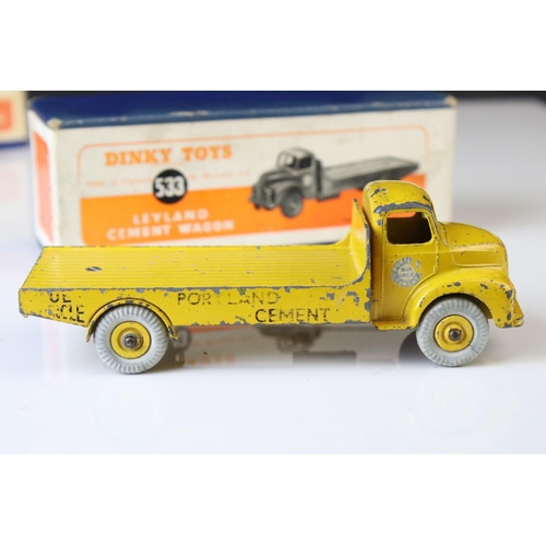 1052 - Two boxed Dinky Supertoys diecast models to include 502 Foden Flat Truck in red (heavy playwear) and... 