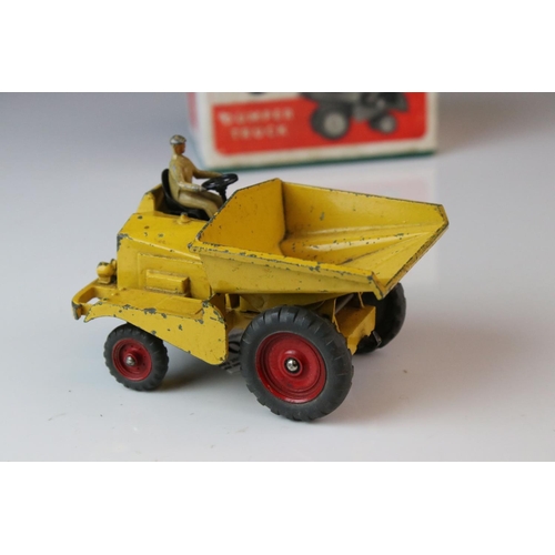 1056 - Two boxed Dinky Supertoys diecast models to include 561 Blaw Knox Bulldozer and 562 Dumper Truck, bo... 