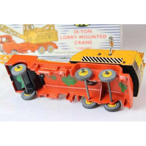 1058 - Two boxed Dinky Supertoys 'Coles' diecast models to include 571 Coles Mobile Crane (vg with paint ch... 