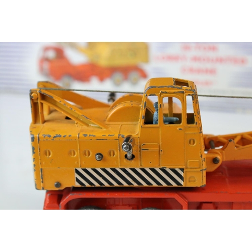 1058 - Two boxed Dinky Supertoys 'Coles' diecast models to include 571 Coles Mobile Crane (vg with paint ch... 