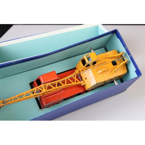 1058 - Two boxed Dinky Supertoys 'Coles' diecast models to include 571 Coles Mobile Crane (vg with paint ch... 