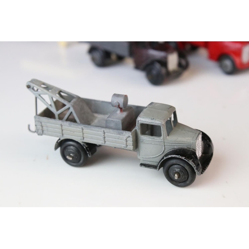 1068 - Five early play worn Dinky diecast models to include 3 x 30e (variants) and 2 x Trucks (1 x red cab,... 