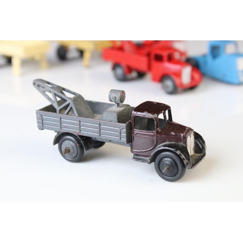 1068 - Five early play worn Dinky diecast models to include 3 x 30e (variants) and 2 x Trucks (1 x red cab,... 