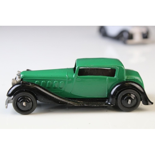 1070 - Nine early-mid 20th C Dinky diecast road models including 2 x 36F, some paint chips and re-painting,... 