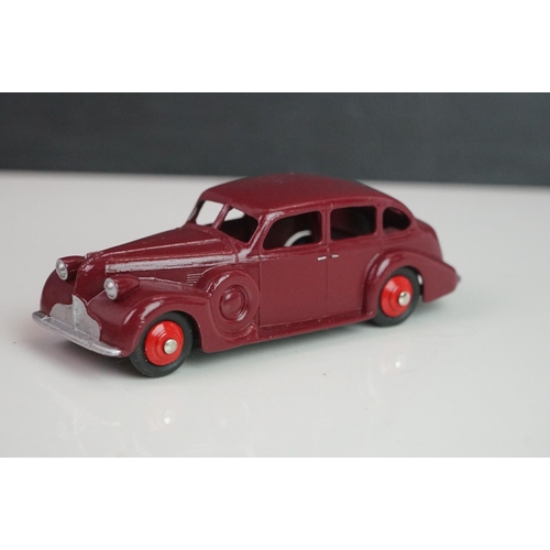 1073 - 12 Mid 20th C Dinky diecast road models to include Buick Roadmaster, Plymouth Plaza, 545 De Soto 59 ... 