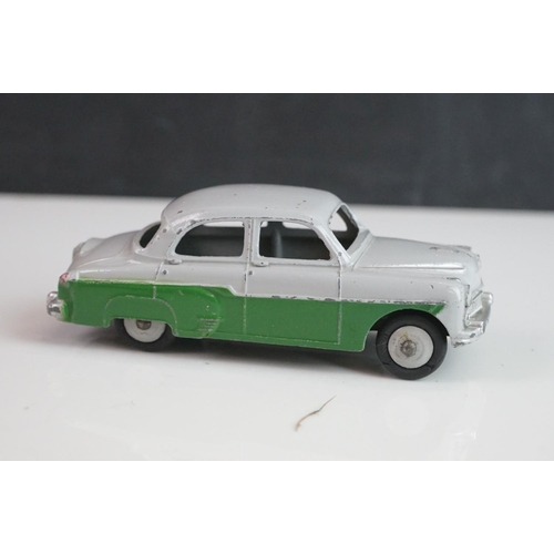 1075 - 12 Mid 20th C Dinky diecast road models to include 179 Studebaker President, 133 Cunningham, Plymout... 