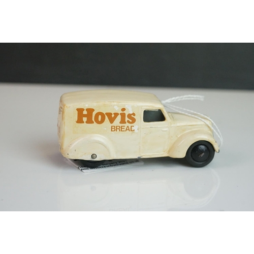 1076 - Six early-mid 20 C Trojan Vans with various later applied decals and paint featuring Hovis, Fireston... 