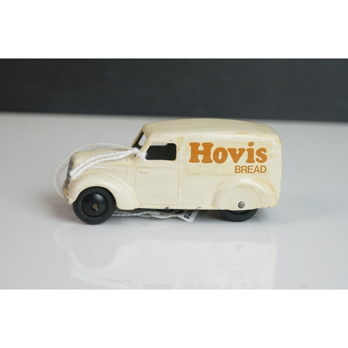 1076 - Six early-mid 20 C Trojan Vans with various later applied decals and paint featuring Hovis, Fireston... 