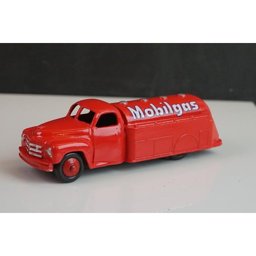 1080 - Four Dinky diecast tankers all reconditioned & painted, with Mobilgas, Castrol, Nationale & Power de... 