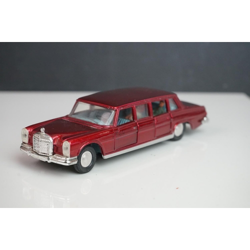 1087 - 13 Mid 20th C Dinky play worn diecast models to include Vanguard x 2, Chrysler, Armstrong Siddeley, ... 