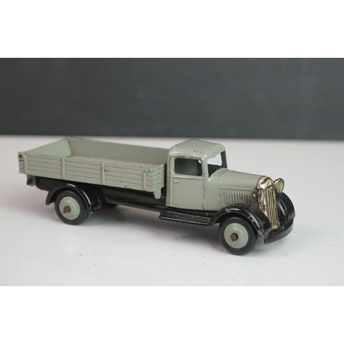 1090 - 11 Early-mid 20th C play worn Dinky diecast models to include 30J Austin, Dodge, Dublo Flatbed Truck... 