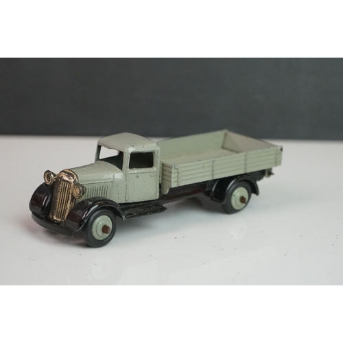 1090 - 11 Early-mid 20th C play worn Dinky diecast models to include 30J Austin, Dodge, Dublo Flatbed Truck... 