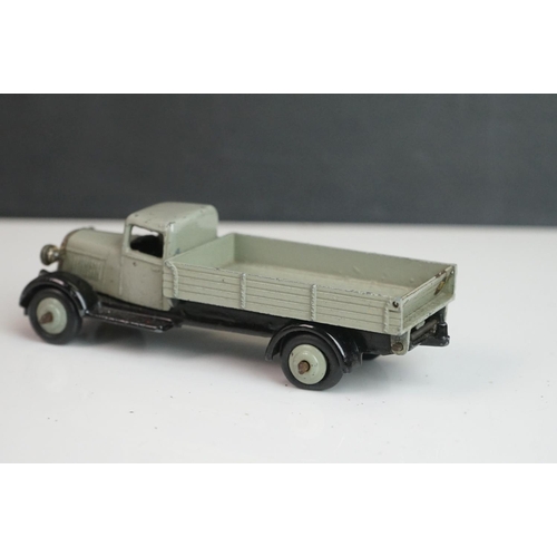 1090 - 11 Early-mid 20th C play worn Dinky diecast models to include 30J Austin, Dodge, Dublo Flatbed Truck... 