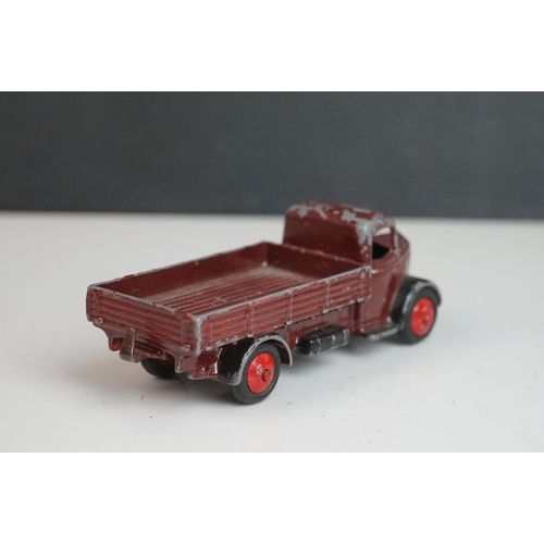 1090 - 11 Early-mid 20th C play worn Dinky diecast models to include 30J Austin, Dodge, Dublo Flatbed Truck... 