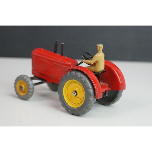 1092 - Three Dinky diecast tractors featuring 2 x Massey Harris & 301 Field Marshall plus 3 x Dinky farming... 