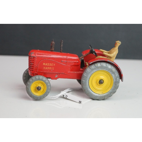 1092 - Three Dinky diecast tractors featuring 2 x Massey Harris & 301 Field Marshall plus 3 x Dinky farming... 