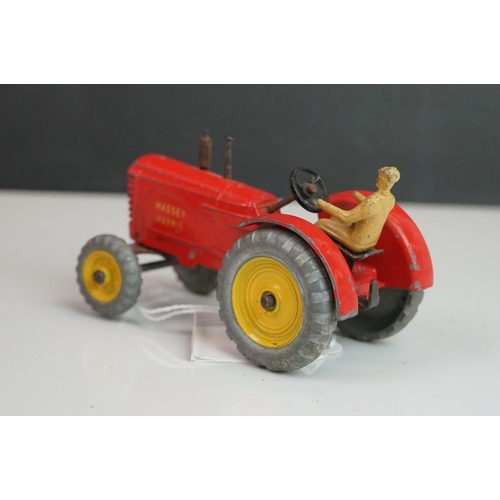 1092 - Three Dinky diecast tractors featuring 2 x Massey Harris & 301 Field Marshall plus 3 x Dinky farming... 