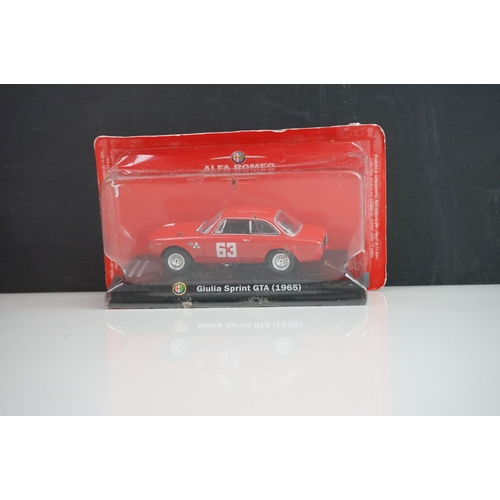 1121 - 26 Boxed and carded diecast models to include 12 x Alfa Romeo, Lledo, Matchbox, Vanguards etc