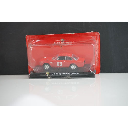 1121 - 26 Boxed and carded diecast models to include 12 x Alfa Romeo, Lledo, Matchbox, Vanguards etc