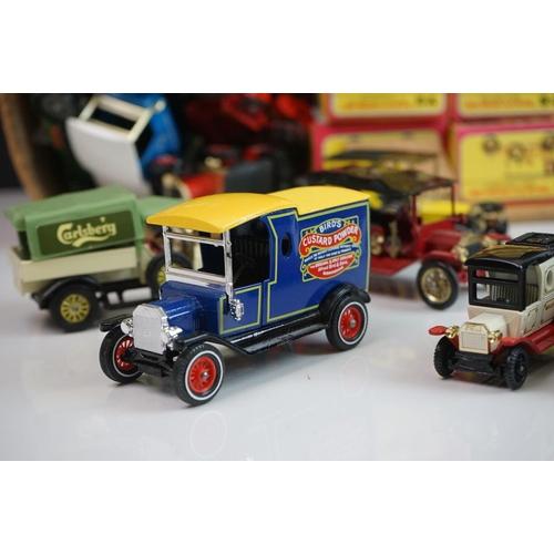 1130 - 15 Boxed Matchbox Models of Yesteryear diecast models in pink/purple & yellow boxes plus a quantity ... 