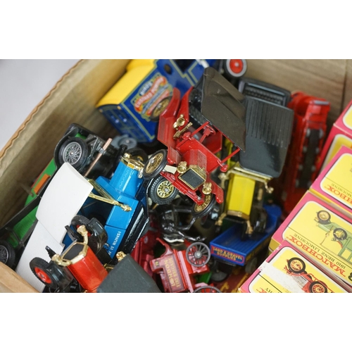 1130 - 15 Boxed Matchbox Models of Yesteryear diecast models in pink/purple & yellow boxes plus a quantity ... 