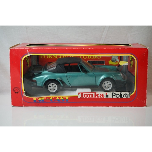 1134 - Seven boxed 1:18 scale Tonka Polistil diecast models to include 5 x Porchse 911 Turbo Cabriolet and ... 