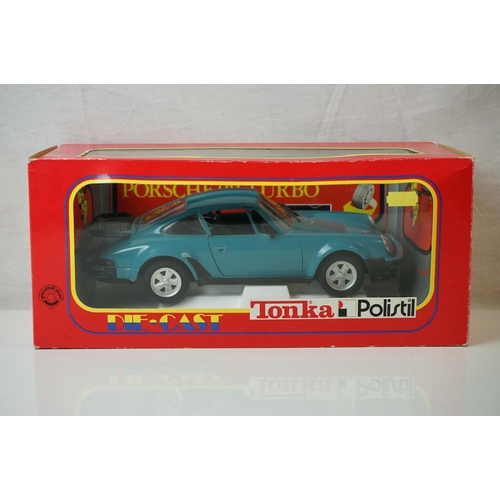 1134 - Seven boxed 1:18 scale Tonka Polistil diecast models to include 5 x Porchse 911 Turbo Cabriolet and ... 