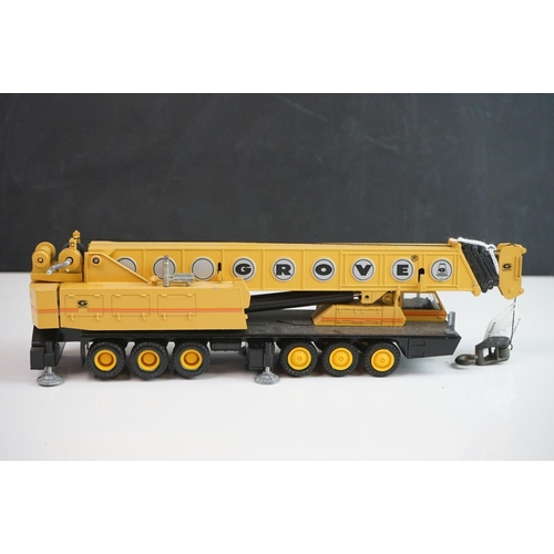 1142 - Three boxed 1:50 diecast construction models to include NZG 152 Grove TM1275, NZG 380 Grove TM9120 C... 