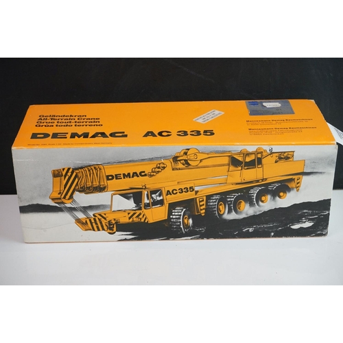 1142 - Three boxed 1:50 diecast construction models to include NZG 152 Grove TM1275, NZG 380 Grove TM9120 C... 