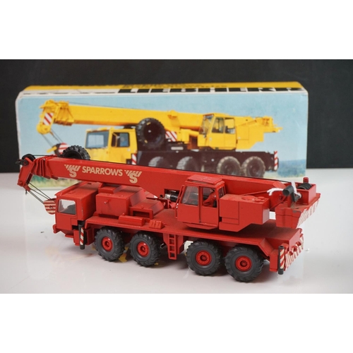 1143 - Three boxed 1:50 Conrad & NZG Liebherr diecast construction models all with Sparrows decals and in r... 