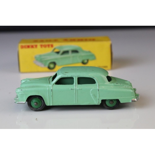 1179 - Boxed Dinky 172 Studebaker Land Cruiser diecast model in mint green, dark green hubs, showing play w... 