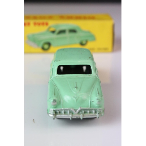 1179 - Boxed Dinky 172 Studebaker Land Cruiser diecast model in mint green, dark green hubs, showing play w... 