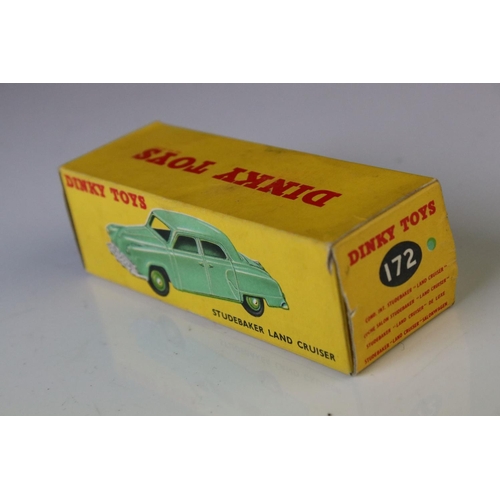 1179 - Boxed Dinky 172 Studebaker Land Cruiser diecast model in mint green, dark green hubs, showing play w... 