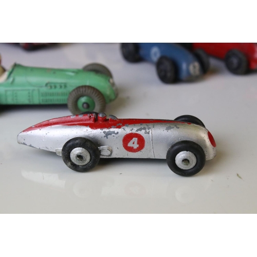 1184 - 12 Mid 20th C play worn Dinky diecast models to include 8 x racing cars, Rover 75, Vanguard etc