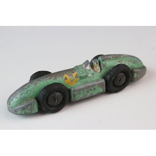 1184 - 12 Mid 20th C play worn Dinky diecast models to include 8 x racing cars, Rover 75, Vanguard etc