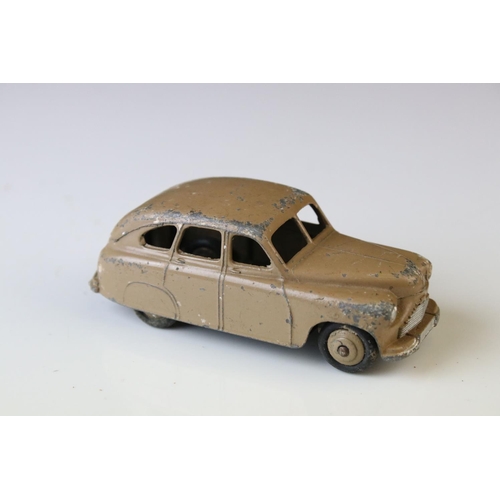 1184 - 12 Mid 20th C play worn Dinky diecast models to include 8 x racing cars, Rover 75, Vanguard etc