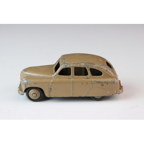 1184 - 12 Mid 20th C play worn Dinky diecast models to include 8 x racing cars, Rover 75, Vanguard etc