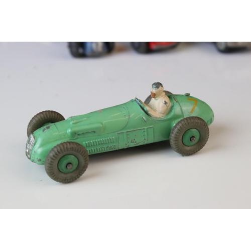 1184 - 12 Mid 20th C play worn Dinky diecast models to include 8 x racing cars, Rover 75, Vanguard etc