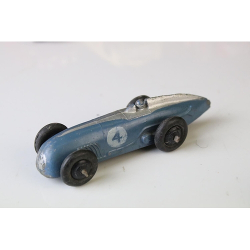 1184 - 12 Mid 20th C play worn Dinky diecast models to include 8 x racing cars, Rover 75, Vanguard etc