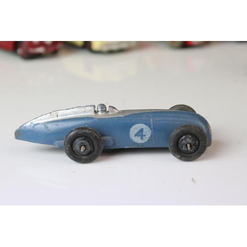 1184 - 12 Mid 20th C play worn Dinky diecast models to include 8 x racing cars, Rover 75, Vanguard etc