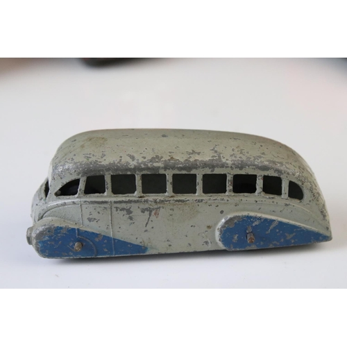 1185 - 16 Mid 20th C play worn Dinky diecast models to include 3 x Foden, 11 x various buses, etc