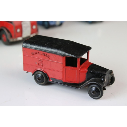 1185 - 16 Mid 20th C play worn Dinky diecast models to include 3 x Foden, 11 x various buses, etc