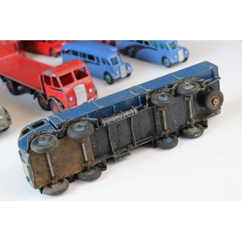 1185 - 16 Mid 20th C play worn Dinky diecast models to include 3 x Foden, 11 x various buses, etc