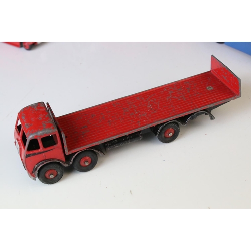 1185 - 16 Mid 20th C play worn Dinky diecast models to include 3 x Foden, 11 x various buses, etc