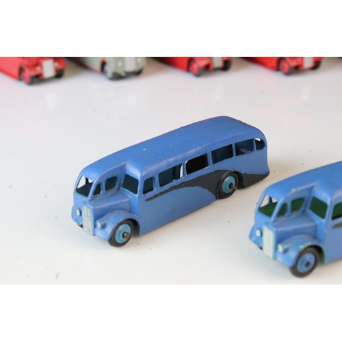 1185 - 16 Mid 20th C play worn Dinky diecast models to include 3 x Foden, 11 x various buses, etc