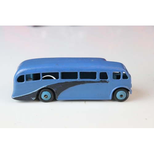 1185 - 16 Mid 20th C play worn Dinky diecast models to include 3 x Foden, 11 x various buses, etc