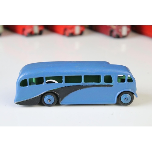 1185 - 16 Mid 20th C play worn Dinky diecast models to include 3 x Foden, 11 x various buses, etc