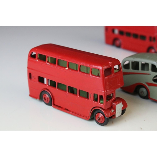 1185 - 16 Mid 20th C play worn Dinky diecast models to include 3 x Foden, 11 x various buses, etc