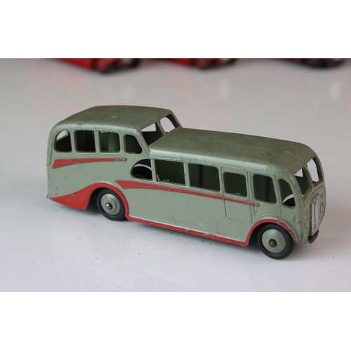 1185 - 16 Mid 20th C play worn Dinky diecast models to include 3 x Foden, 11 x various buses, etc